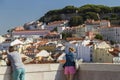Tourists at the Arco da Rua Augusta viewpoint in Lisbon