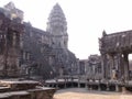 Two tourists inside the Angkor Wat temple in the Khmer temple complex of Angkor