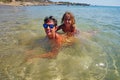 Two tourists take a bath in Farangas beach, Paros