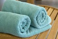 Two towels braided in a tubule on chair Royalty Free Stock Photo