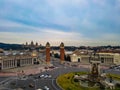 Two towers roundabout fountain font magica de montjuic castle fortress hill Barcelona warm light placa de espanya spain