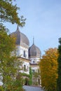 two towers of water castle Schwindegg, autumnal trees, blue sky with copy space Royalty Free Stock Photo