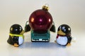 Toy Penguins Loading Xmas Ornament into Truck Royalty Free Stock Photo