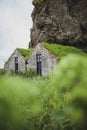 Two traditional Iceland stone houses with stone walls, moss roof Royalty Free Stock Photo