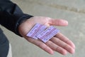 Two train tickets in hand of a girl Royalty Free Stock Photo