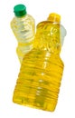 Two transparent plastic bottles of vegetable oil in palm and soybean oil in stack isolated on white background with clipping path Royalty Free Stock Photo