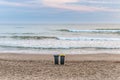 Two trash cans on the beach Royalty Free Stock Photo