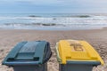 Two trash cans on the beach Royalty Free Stock Photo