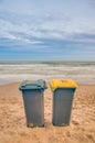 Two trash cans on the beach Royalty Free Stock Photo