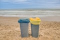 Two trash cans on the beach Royalty Free Stock Photo