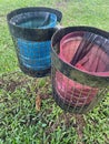 Two trash cans in a park Royalty Free Stock Photo