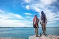 Two traveler young women seeing the beautiful beach and blue sky Royalty Free Stock Photo