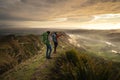 Two travelers walking on the Te Mata Peak in New Zealand Royalty Free Stock Photo