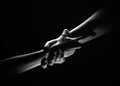 Two trength ands. Helping hand to a friend. Rescue or helping gesture of hands. Concept of salvation. Hands of two power