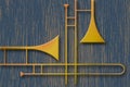 Two trombones are seen in a colorful graphic image about music and brass instruments