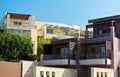 Two tropical apartment buildings.