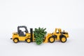 Two truck moving Christmas tree Royalty Free Stock Photo