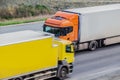 Two Trucks Drive in Opposite Directions Royalty Free Stock Photo
