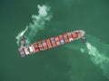 two tug boat towing cargo container in warehouse harbor at thailand . Royalty Free Stock Photo