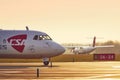 Two turboprop airplanes before take off