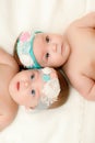 Two twin babies, girls in nice headbands Royalty Free Stock Photo