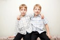 Two twins brothers hugging and smiling. Royalty Free Stock Photo
