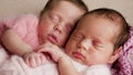 Two twins newborn sleeping