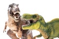Two Tyrannosaurus Rex figurines on white Royalty Free Stock Photo
