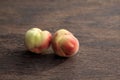 Two ugly peaches. Selective focus, copy space. Concept - reducing food waste