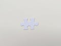 A puzzle piece on white background. Problem solving, teamwork and the integration of different elements Royalty Free Stock Photo