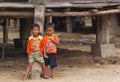 Two unidentified boys smiles for the camera in the suburb of Nha Trang.