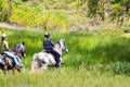 Two unidentified women riding horses on the hills of south San Francisco bay area, Santa Clara county, California