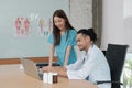 Two uniformed young doctors work in medical clinic office Royalty Free Stock Photo