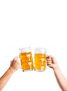 Two unrecognizable men clinking with beer mugs, studio shot Royalty Free Stock Photo