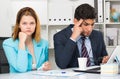 Two upset business partners Royalty Free Stock Photo