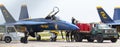 Two US Navy Blue Angels jets being serviced by the crew after a flight Royalty Free Stock Photo