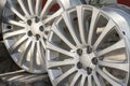 Two used old original Subaru alloy wheels, outside. close up