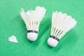 Two used white badminton shuttlecocks Royalty Free Stock Photo