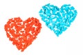 Two Valentine hearts of torn pieces of red and blue paper