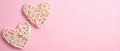 Two Valentine`s heart on pink background. Flat lay, top view. Happy Valentine`s Day banner mockup with, copy space. Love concept