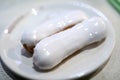 Two vanilla eclairs with icing Royalty Free Stock Photo