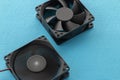 Two vector computer fans rotating and off on blue background Royalty Free Stock Photo