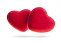 Two velvet hearts on a white background.