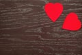 Two velvet hearts on a wooden Board on Valentine`s day Royalty Free Stock Photo