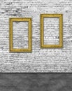 Two vertical golden frames on brick wall