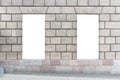 Two vertical mock up`s of store blank showcase window in a city Royalty Free Stock Photo