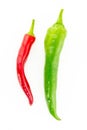 Two vertical pods of hot pepper red green vertical big small culinary background design Royalty Free Stock Photo