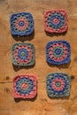 Two vertical rows of granny squares shot from above in hard ligh Royalty Free Stock Photo