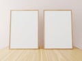Two vertical wooden frame mockup on wooden table. 3d rendering Royalty Free Stock Photo