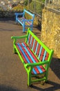 Two very colorful benches